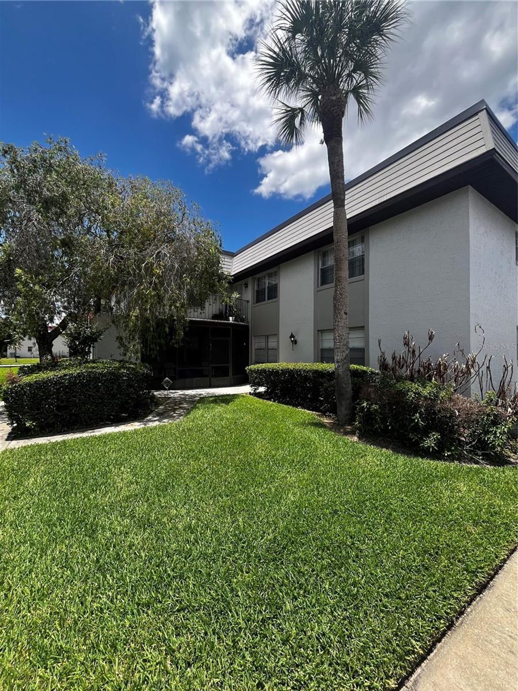 Photo of 110 Windtree Lane #202, Winter Garden, FL 34787 (MLS # O6414527)
