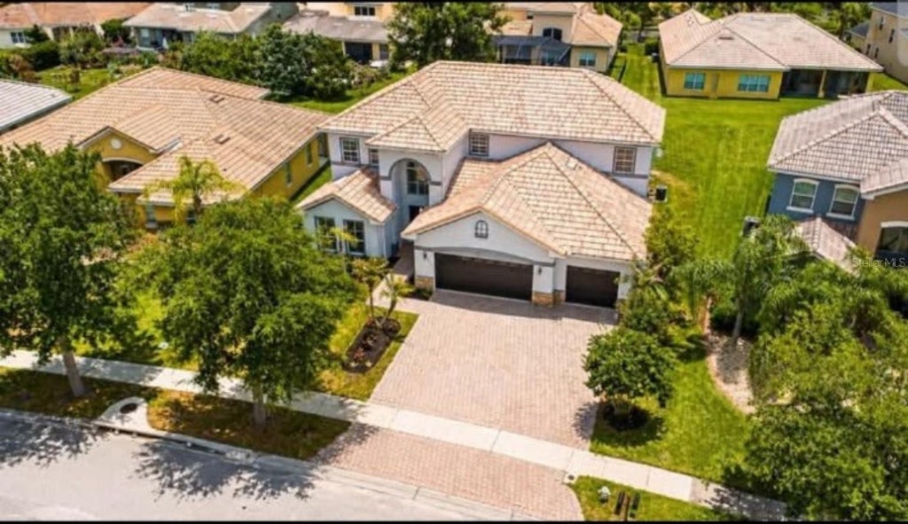 Photo of 3747 Eagle Isle Circle, Kissimmee, FL 34746 (MLS # O6448959)
