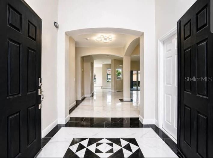 Photo of 3747 Eagle Isle Circle, Kissimmee, FL 34746 (MLS # O6448959)