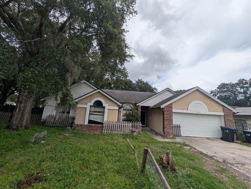 Photo of 3486 Hillmont Circle, Orlando, FL 32817 (MLS # O6443309)