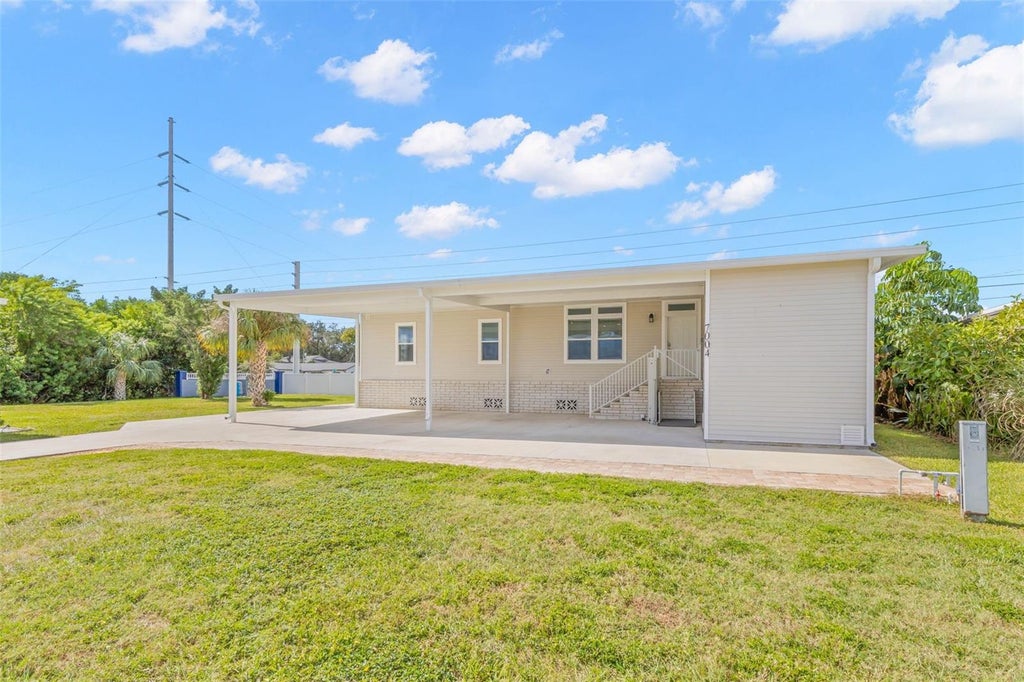 Photo of 7004 Americana Drive NE #136, St Petersburg, FL 33702 (MLS # TB8562505)