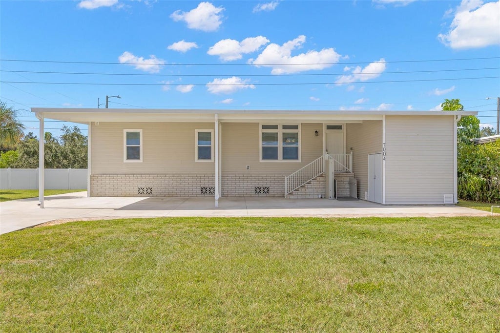 Photo of 7004 Americana Drive NE #136, St Petersburg, FL 33702 (MLS # TB8562505)