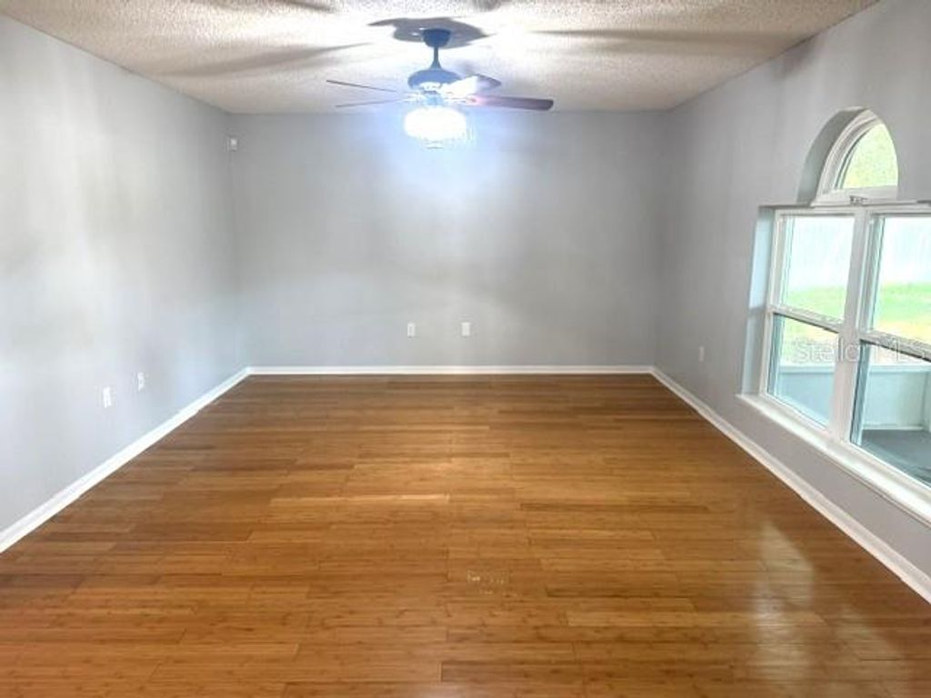 Photo of 409 Yearling Cove Loop, Apopka, FL 32703 (MLS # O6424670)