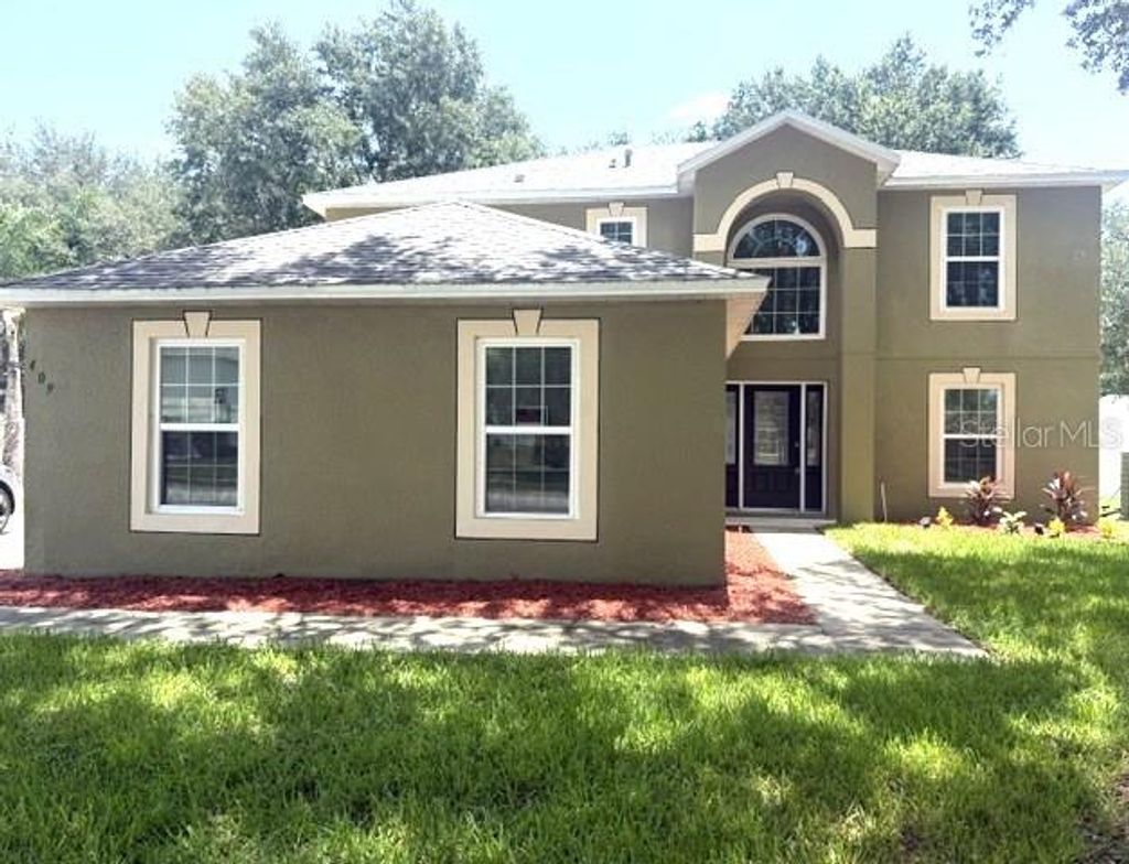 Photo of 409 Yearling Cove Loop, Apopka, FL 32703 (MLS # O6424670)