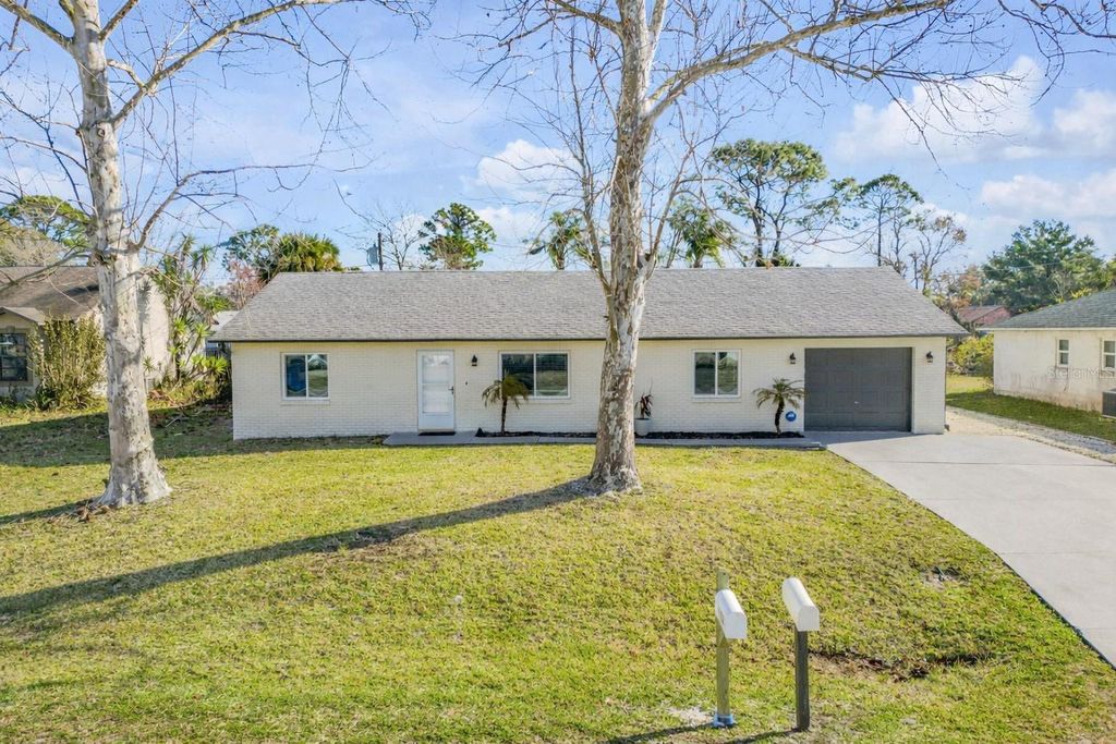 Photo of 3421 Yule Tree Drive, Edgewater, FL 32141 (MLS # NS1087195)
