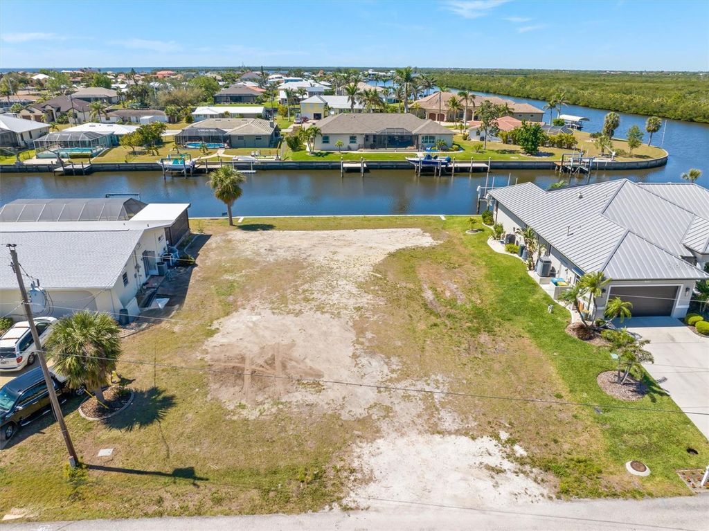 Photo of 143 Leland Street SW, Port Charlotte, FL 33952 (MLS # C7507345)