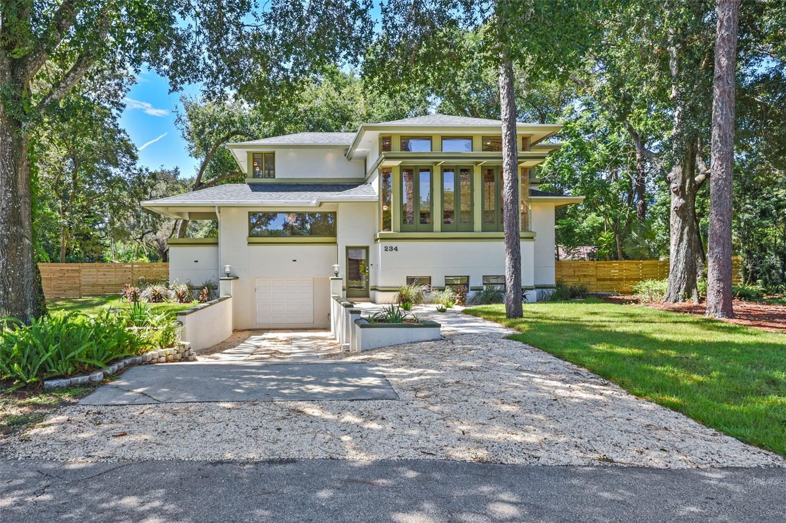 Located in the heart of Altamonte Springs, this one-of-a-kind architectural gem blends timeless design with modern updates. Designed and built by a local architect inspired by the work of Frank Lloyd Wright, this 2,800 sq. ft. home offers 3 bedrooms, 3.5 baths, and distinctive craftsmanship throughout. Rich wood detailing flows through the spacious interior, complemented by a brand-new kitchen featuring quartz countertops, modern appliances, and custom finishes. The stunning Florida room, anchored by a new oversized picture window, invites natural light and tranquil views. Recent updates include fully renovated bathrooms, fresh paint, new fixtures, tile and cork flooring, updated landscaping, and a fenced backyard with a new patio perfect for entertaining or relaxing in privacy. Nestled in a quiet neighborhood yet minutes from premier shopping, dining, and conveniences, this property offers a rare combination of character, comfort, and location! This home is truly a must see!