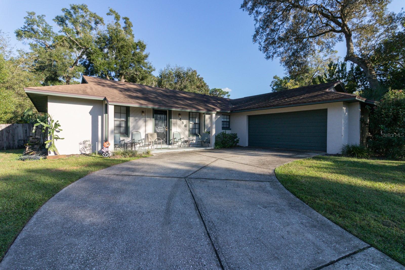 Under contract-accepting backup offers. Step inside to find a thoughtfully designed open floor plan that creates a natural flow for both everyday living and entertaining. The cozy atmosphere is enhanced by a mix of original character and thoughtful upgrades, giving you a solid foundation with room to add your personal touches.
The true showstoppers? The abundant outdoor space and incredible parking options! Relax on your screened rear patio – perfect for morning coffee or evening gatherings without the bugs. The expansive driveway and 2-car garage provide parking for up to 6 vehicles, ideal for families with multiple cars, guests, or your recreational toys. Newer Hot water heater and HVAC System.
Highlights:
Spacious half-acre lot offering privacy and possibilities,
Storage Shed in the back yard,
Open floor plan for modern living,
Screened patio for year-round Florida enjoyment,
Oversized driveway with 2-car garage,
No HOA fees or restrictions,
Sewer assessment already paid off – transitioning to public sewer soon!
Established neighborhood with mature landscaping. Short drive to Wekivia Springs State Park, Apopka Amphitheater, Kelley Park and Rock Springs.  
This is more than just a house – it's a place to create lasting memories with plenty of room to grow. Come see why 456 Bison Circle could be your next home sweet home!