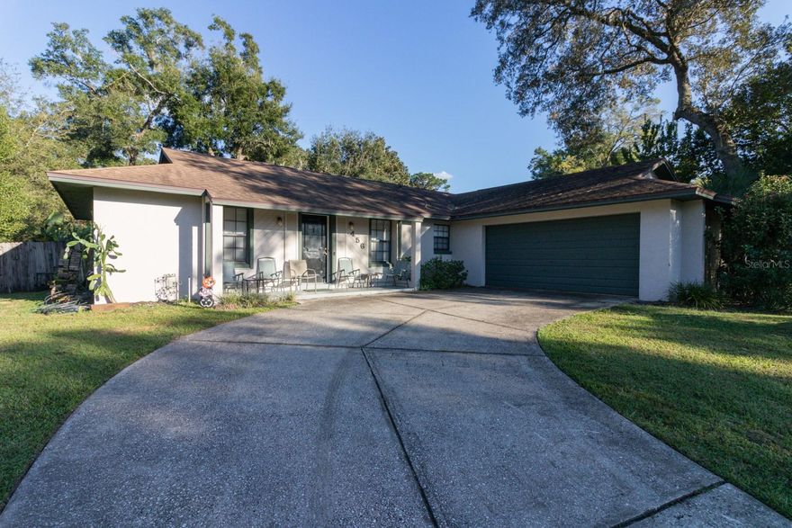 Step inside to find a thoughtfully designed open floor plan that creates a natural flow for both everyday living and entertaining. The cozy atmosphere is enhanced by a mix of original character and thoughtful upgrades, giving you a solid foundation with room to add your personal touches.
The true showstoppers? The abundant outdoor space and incredible parking options! Relax on your screened rear patio – perfect for morning coffee or evening gatherings without the bugs. The expansive driveway and 2-car garage provide parking for up to 6 vehicles, ideal for families with multiple cars, guests, or your recreational toys. Newer Hot water heater and HVAC System.
Highlights:
Spacious half-acre lot offering privacy and possibilities,
Storage Shed in the back yard,
Open floor plan for modern living,
Screened patio for year-round Florida enjoyment,
Oversized driveway with 2-car garage,
No HOA fees or restrictions,
Sewer assessment already paid off – transitioning to public sewer soon!
Established neighborhood with mature landscaping. Short drive to Wekivia Springs State Park, Apopka Amphitheater, Kelley Park and Rock Springs.  
This is more than just a house – it's a place to create lasting memories with plenty of room to grow. Come see why 456 Bison Circle could be your next home sweet home!