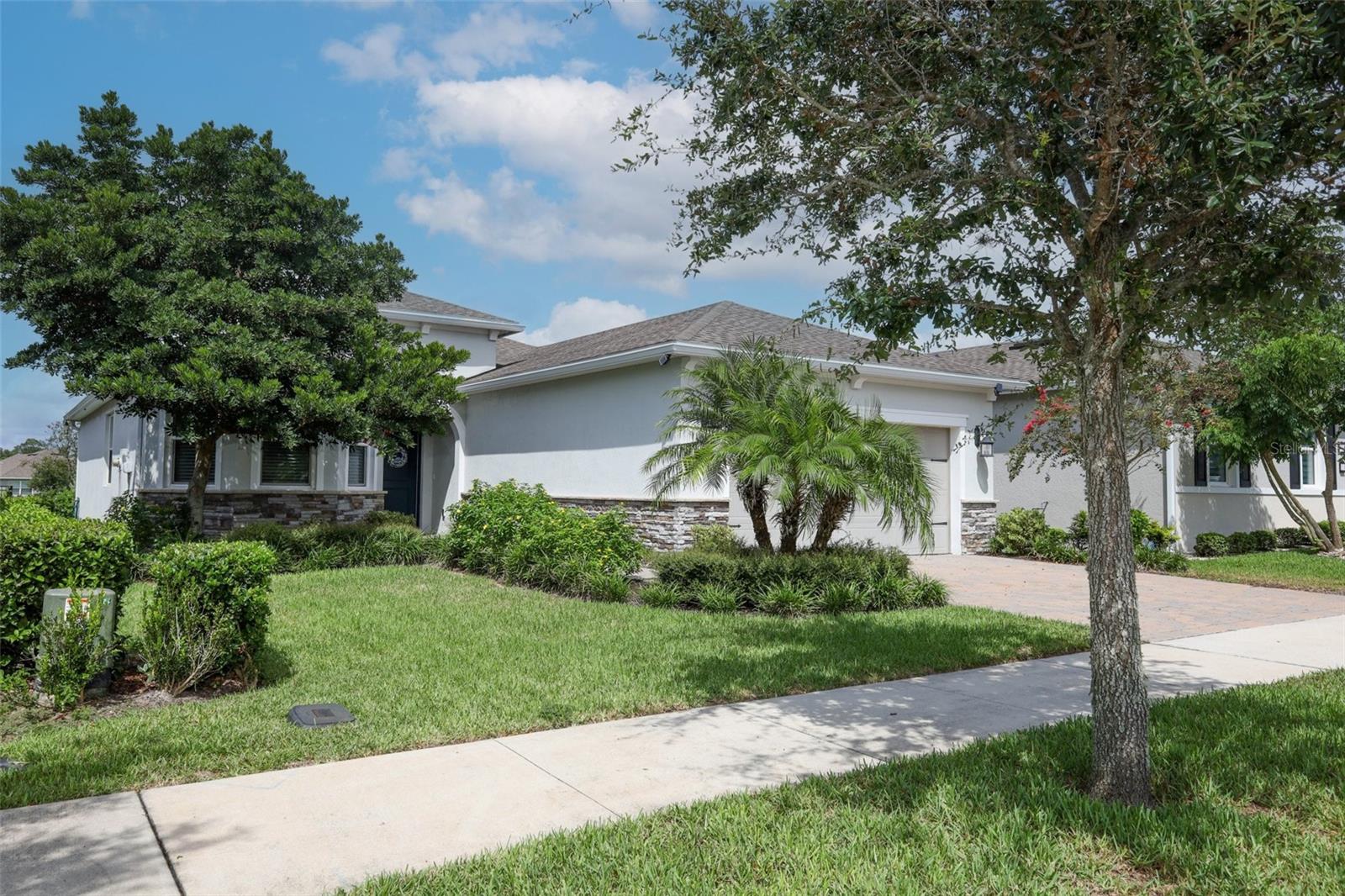 Welcome home to Victoria Park, a beautiful development in Deland, Florida, 25 minutes to Daytona Beach, 30 minutes to Orlando. Downtown Deland has a plentiful variety for dining and shopping, and is home to Stetson University. Residents in Victoria Park can enjoy the 18 hole golf course, 2 pools, 2 fitness centers, a Clubhouse with a restaurant and as a plus, a medical center, with doctors offices, an Imaging facility and a lab, all within the community. Also, restaurants, hair salon, wine bar, and other small businesses. This home is located in Victoria Hills, a friendly neighborhood , one of five villages within the Park. It has 2 bedrooms, plus den, great kitchen with granite countertops and cozy breakfast nook with bay windows; a formal dining room, huge primary bedroom, also with bay windows, an on-suite bathroom with 2 vanities, a large walk in shower and a huge walk in closet. The family room has triple sliding doors overlooking a private screened-in extended lanai with an open view of a calming pond. The den is perfect for an office, a tv room or could be converted to an extra bedroom. The laundry room has lots of storage with a closet, plus overhead cabinets. The HOA dues include new fiber optic streaming and 5 G internet, plus lawn irrigation.