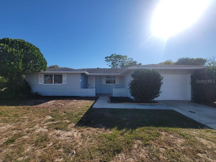 Don’t miss this beautifully updated 3-bedroom, 2-bathroom home situated on a desirable corner lot. Enjoy a welcoming covered front porch, perfect for morning coffee or relaxing evenings.

Inside, you’ll find tile flooring in the hall, kitchen, and bathrooms, with newer vinyl flooring throughout the living, dining, and bedroom areas—no carpet! The kitchen comes fully equipped with all appliances and offers ample cabinet storage.

The split floor plan provides privacy, with the owner’s suite featuring a large walk-in closet and private full bathroom. Sliding glass doors off the dining area lead to a covered and screened patio, ideal for entertaining or enjoying the Florida weather.

The home also features a large open backyard, 1-car garage, and washer/dryer hookups.
Pet friendly—breed restrictions apply.