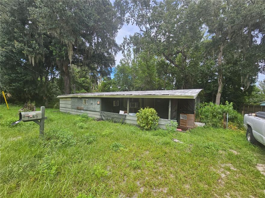 Nestled in the peaceful community of Ponderosa Club near Lake George in Salt Springs, FL, this mobile home presents a fantastic opportunity for those with a vision for renovation! This 2-bedroom, 1-bath home is ready for a complete overhaul, offering a blank canvas to create your dream retreat. Located in a prime spot with access to two private boat ramps, you’ll enjoy all the outdoor activities Salt Springs is known for, including boating, fishing, and water sports.