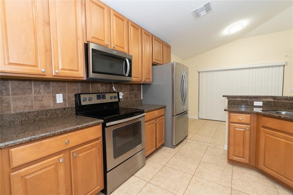 Photo of 9018 Verona Sound Way, Orlando, FL 32829 (MLS # O6424425)