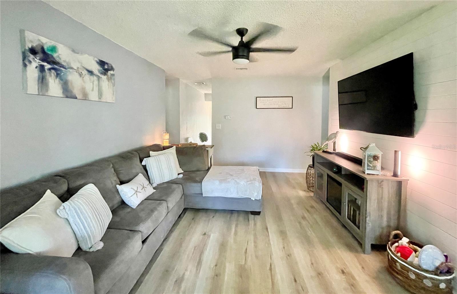 Welcome to your tranquil Palm Coast retreat, where comfort meets modern updates in this upper-floor, 2-bedroom, 2-bath condo tucked away on a quiet cul-de-sac. New luxury vinyl flooring (July 2025) flows throughout, adding warmth and style as you enter.
Sip your morning coffee on the screened patio overlooking mature trees and enjoy a serene indoor space featuring newer kitchen cabinets and appliances, stylish lighting, ceiling fans, and a coastal-inspired shiplap accent wall.
Steps from Palm Harbor Golf Course, scenic trails, the Intracoastal, and the cinnamon-colored shores of Flagler Beach, this move-in ready home also offers access to a heated pool, sauna, tennis courts, clubhouse, and more. Pet-friendly with some restrictions.
Ideal for year-round living or a seasonal getaway—this is low-maintenance Florida living at its best.