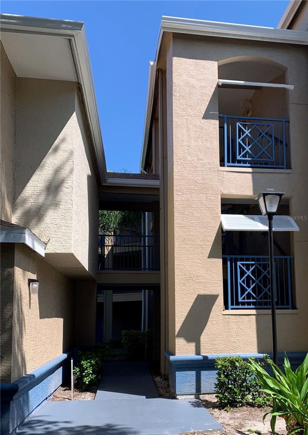 Photo of 7330 Westpointe Boulevard #434, Orlando, FL 32835 (MLS # O6400231)