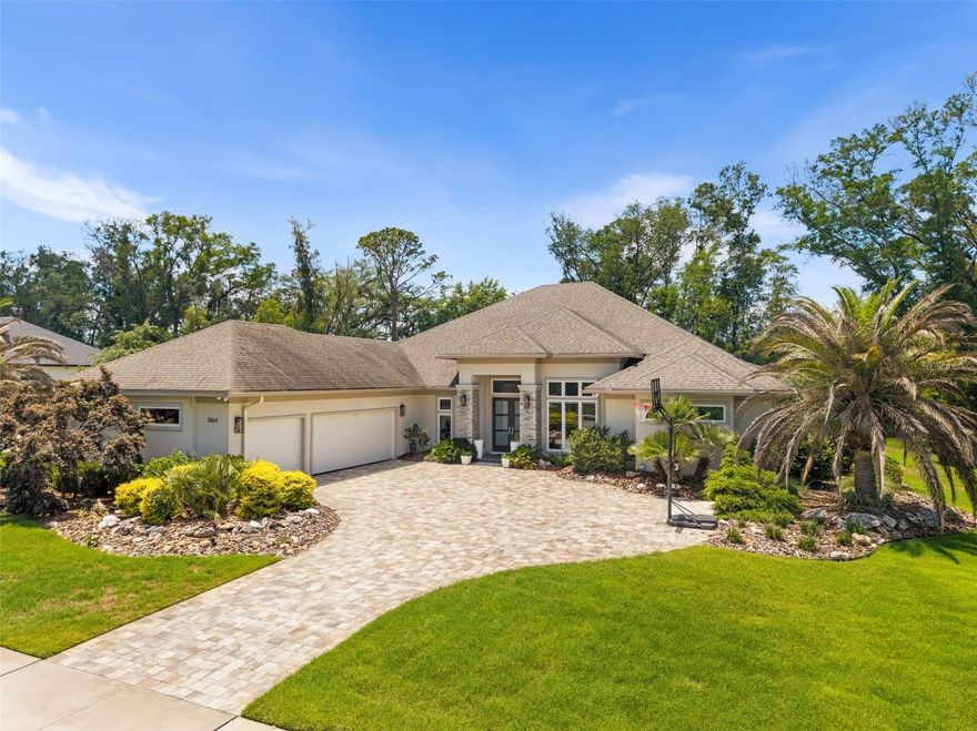 Perfectly positioned on a premium half-acre lot backing to peaceful green space, this stunning luxury home offers over 3,600 sq ft of thoughtfully designed living space with 4 bedrooms, 4.5 baths, a private study, and an oversized recreational/media room. Sophisticated architectural details, custom tray ceilings, modern lighting, sleek finishes, and abundant natural light create an elegant, contemporary feel throughout the home.  The private study features sliding barn doors and custom built bookshelves and cabinetry, while the recreational/media room flows seamlessly into the Florida room and outdoor living spaces. Designed for effortless indoor-outdoor living, the resort-style backyard showcases a sparkling pool with sun shelf and waterfall feature, shaded lounging areas, outdoor fireplace, and fully equipped summer kitchen—perfect for year-round entertaining! The chef’s kitchen is both beautiful and functional, featuring an oversized quartz island, stainless steel appliances, a modern, glass backsplash, oversized pantry, coffee bar, abundant storage, a wine/beverage refrigerator, and many other features! The luxurious owner’s retreat is special: dual custom closets, a frameless glass walk-in shower AND a six-foot freestanding soaking tub!  Additional highlights of the home include a paver driveway leading to the 3-car garage with EV charging station disconnects, remote-control shades, LED "Holiday Trim lights for pool and front of the home, a spacious laundry room with stone countertops and exceptional storage throughout. Blending modern elegance, comfort, and craftsmanship, this remarkable home offers the lifestyle you have been waiting for in one of the most desirable communities in Gainesville!  Close to UF, UF Health, North Florida/HCA, the conveniences and walking trails of the Haile Village, with the serenity of a luxurious retreat!