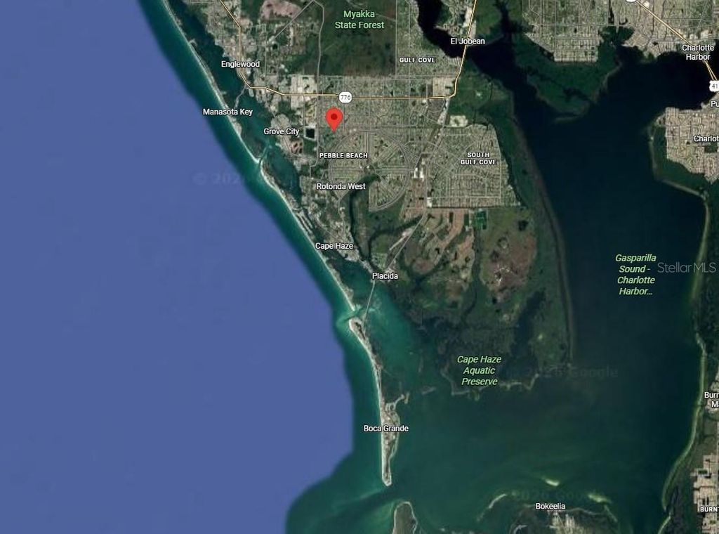 Photo of 105 Swan Drive, Rotonda West, FL 33947 (MLS # C7516407)