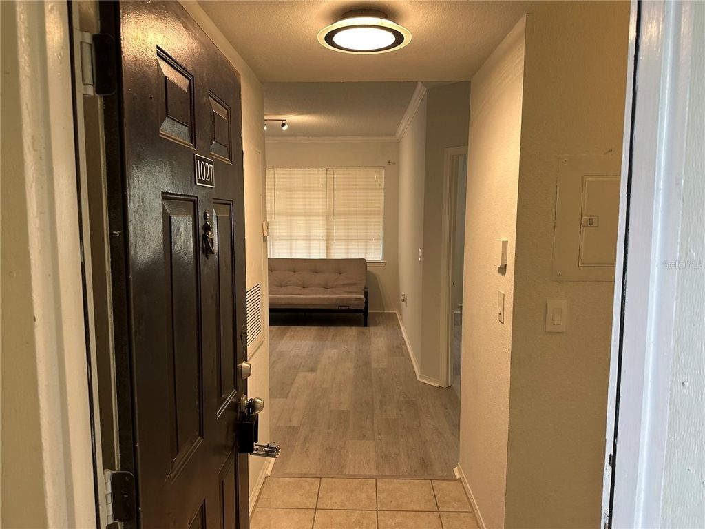 Photo of 2598 Robert Trent Jones Drive #1027, Orlando, FL 32835 (MLS # O6382382)