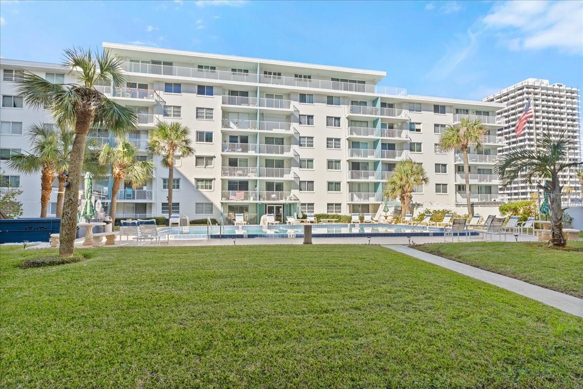 Imagine living just steps away from the world-famous Daytona Beach at an incredible price! This beautiful, partially-furnished one-bedroom condo features 18'' ceramic tile floors throughout and a spacious balcony that overlooks a lush green courtyard and expansive pool. Spend your days enjoying the beach, shopping at the nearby Bel-Air Plaza, or dining and listening to music at the many restaurants within walking distance. Schedule your tour today!