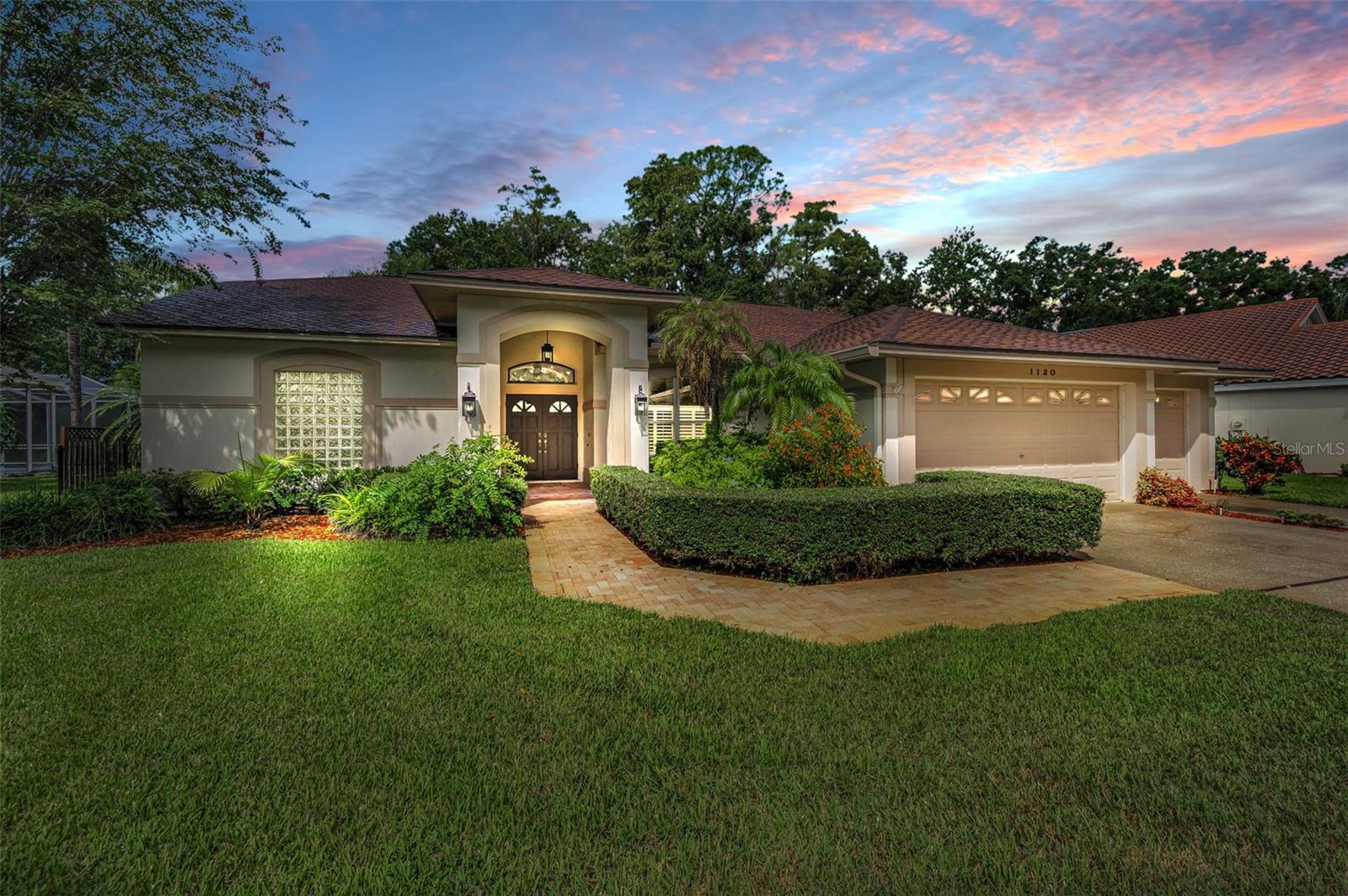 Look forward to coming home! Live on a quiet street in Eastlake Woodlands with a great pond view. Located in Hunter’s Crossing, with three bedrooms, 2 baths, solar heated pool and 3 car garage. Entertain in the formal living and dining rooms, or casually outside on the expansive pavered deck. The screen enclosed swimming pool has a covered lanai, spa and great landscaped views of the pond. There is a pass thru to the kitchen. Enjoy the chef’s kitchen complete with stainless appliances, granite counters and a large center island. The primary bedroom is a retreat with crown molding, sliding doors to the pool area and an ensuite bath. The primary bath was remodeled with walk in shower, his and her sinks, granite counters and garden tub. Two additional bedrooms and bath are in a split plan. Eastlake Woodlands is a golf and tennis community with two renowned golf courses and clubhouse. Membership in the newly remodeled Ardea Country Club is required to enjoy golf, tennis, pickle ball, swimming pools, child activity center, restaurant and newly refurbished gym. Eastlake Woodlands is central to all dining, shopping and highly rated schools. A short drive will take you to all area beaches, activities, sporting events and the Tampa International Airport. For more pictures, be sure to watch the video with drone photography and a walk thru of the home.