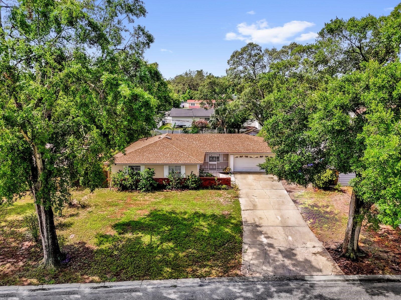 This Motivate seller welcomes you to her beautiful 4 bedrooms and 2 baths house. Newly renovated: New Roof; freshly pain, a new remodeling kitchen with granite countertop and eating space that creates the perfect space for family and entertaining. Dining and family room combo. Large Livingroom. Tile throughout the house except for the living rom. Both bathrooms are also newly remodel. As beautiful as you see the pictures, the house is much more with banana plants, papaya trees, pineapple plants, Lime tree, vegetables plants and much more. Come see for yourself, as you walk to the front porch, you'll fall in love with this house before you even walk in.