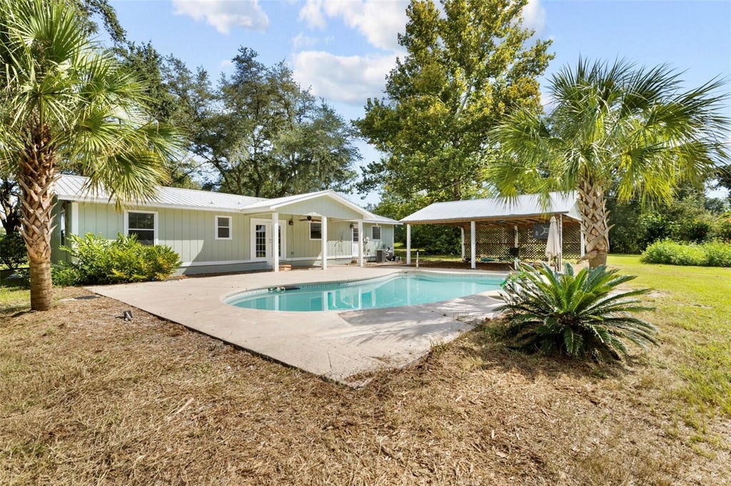Photo of 1869 SW 32nd Place, Bell, FL 32619 (MLS # GC543689)