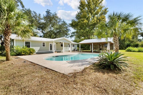 Photo of 1869 SW 32nd Place, Bell, FL 32619 (MLS # GC543689)