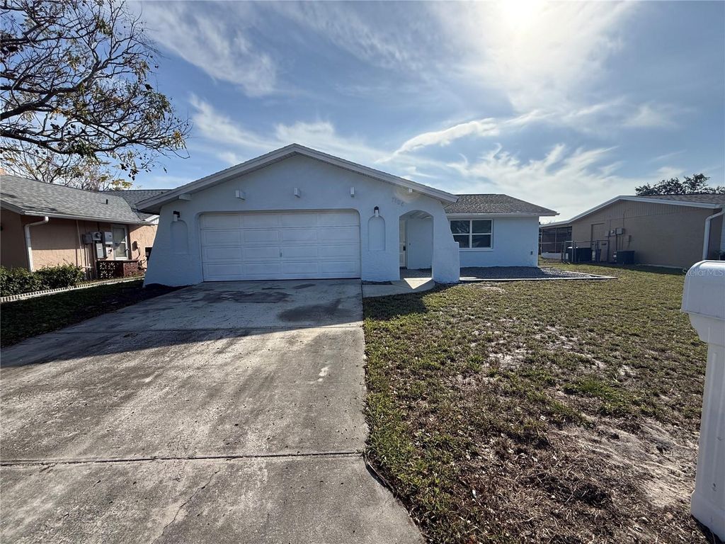 Photo of 7104 Ingleside Drive, Port Richey, FL 34668 (MLS # TB8456791)