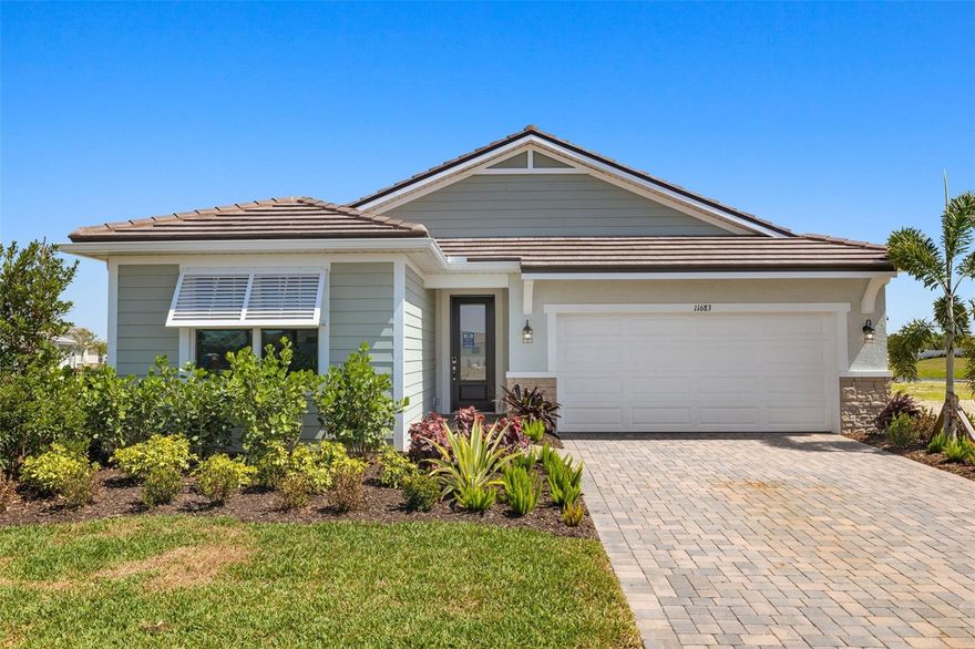 The Sage Coastal exterior is a single-family home with 2,193 sq. ft. has 2 bedrooms, a study and 2 and half baths. The welcoming foyer has convenient powder bath on the way to the open concept living area. This magnificent space is full of natural light, thanks to numerous windows and a 12-foot multi-sliding glass door leading to the covered lanai, which has been extended, and covered, which is perfect for enjoying the Florida lifestyle. The open space of the combined dining area and Great Room are perfect for relaxing or entertaining.  The luxurious owner’s suite offers an expansive walk-in closet, linen closet and bath with a large shower, with bench seat. Bedroom two has its own private full bath, and linen closet.  The garage has room for storage it comes with a garage door opener. This home has impact windows and doors, tile roof, and paver driveway. This Smart Home includes an Ecobee Smart Thermostat - Amazon Alexa compatible, Video Doorbell - with app, video recording and 2-way communication and ClareOne Touchscreen Panel! Wellen Park's only 55+ Community featuring future Amenity Center (21,000 sq ft) with 8 Pickle Ball Courts, 1 Stadium Court, 2 Pools (1 lap pool/1 resort style pool), State of the Art Fitness Facility, Bar and Cafe overlooking pools, dog park, Outdoor Exercise Lawn, Hot Tub, Full Time Lifestyle Director and so much more! Just minutes from beaches, Downtown Wellen Park, restaurants and shopping via golf cart/bikes or walking. Pricing, dimensions and features can change at any time without notice or obligation. Photos, renderings and plans are for illustrative purposes only and should never be relied upon and may vary from the actual home.