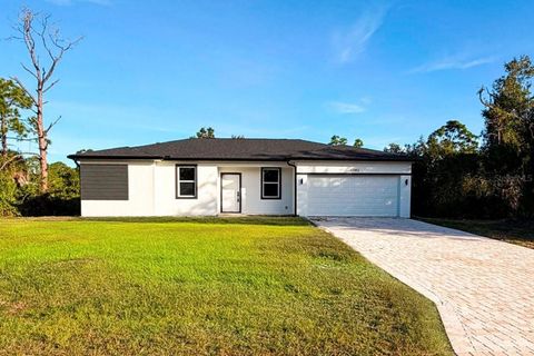 Photo of 12452 Sunniland Avenue, Port Charlotte, FL 33981 (MLS # S5140395)
