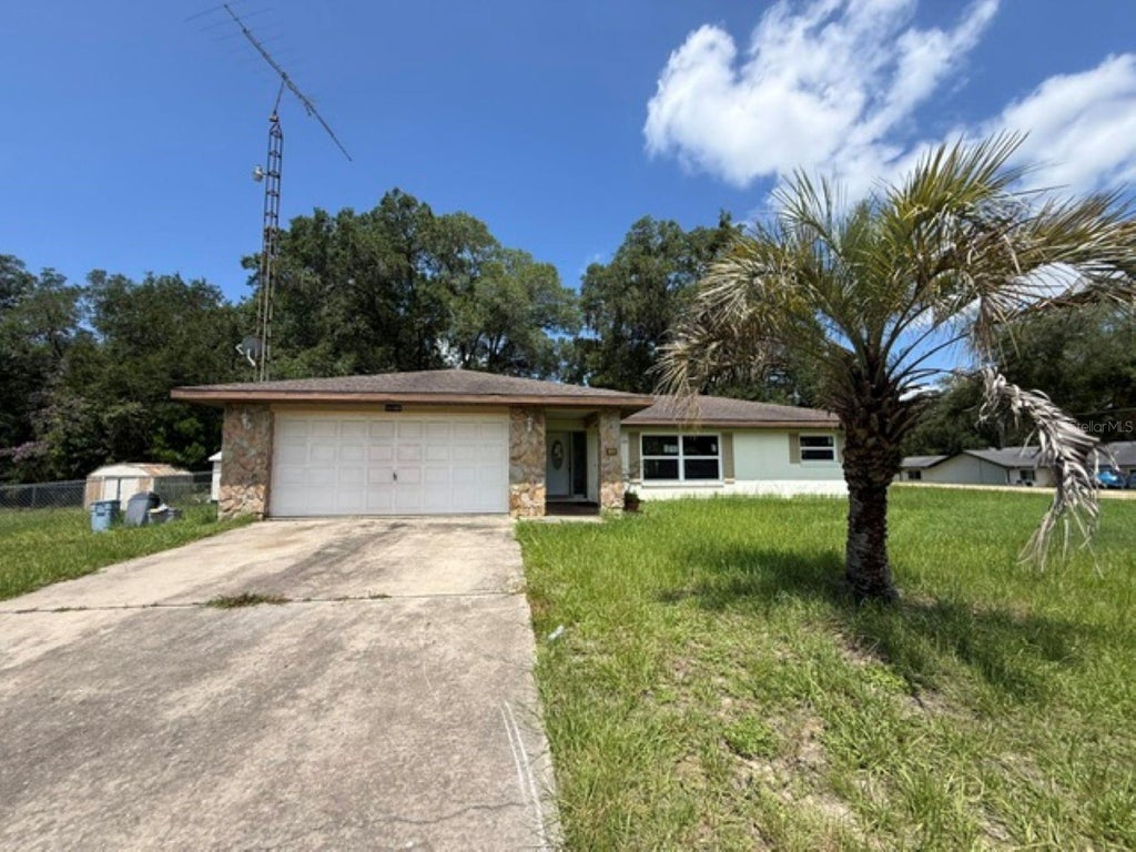 Photo of 11160 SW 136th Court Road, Dunnellon, FL 34432 (MLS # OM727534)