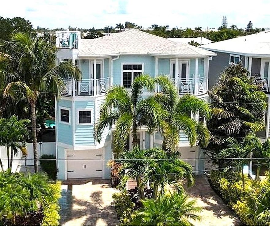 Luxury Beach Retreat Just 2 Minutes from the Gulf! Welcome to Beach Breeze, a coastal oasis designed for pure relaxation and unforgettable memories. This beautifully appointed 6-bed, 4.5-bath home blends high-end luxury with the easy comfort of beachside living—perfect as a personal getaway or a standout vacation rental. Step into your own private tropical escape featuring a resort-style pool with a sun shelf, hot tub, and a soothing waterfall feature. Mix a drink at the outdoor bar, lounge on the spacious patio, or head up to the rooftop deck for stunning Gulf views and sunset magic. Inside, the open layout is bright, inviting, and made for gathering—complete with generous guest space and upscale finishes throughout. Every detail is designed for effortless entertaining and maximum enjoyment. And the best part? The beach is just a 2-minute walk away. Luxury, location, and lifestyle all come together here—Beach Breeze is a must-see.