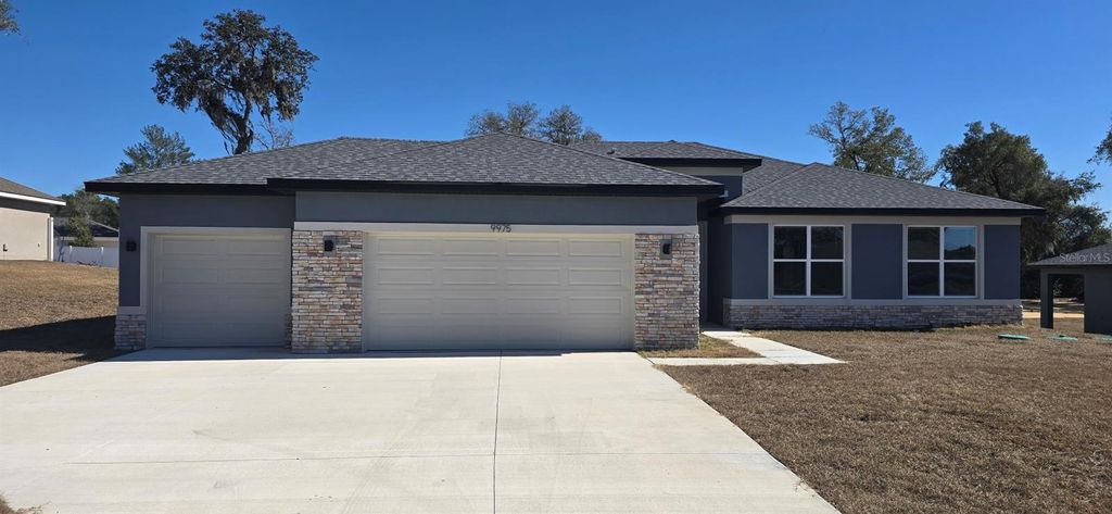 Photo of 9975 SW 39th Terrace, Ocala, FL 34476 (MLS # OM721401)