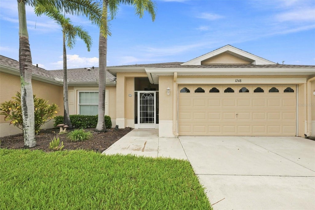 Photo of 1248 Corinth Greens Drive, Sun City Center, FL 33573 (MLS # TB8548789)