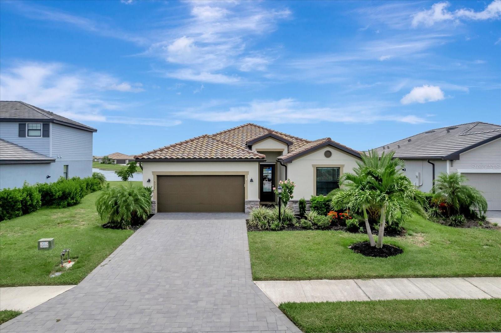 Welcome to 5327 Coral Reef Way—where thoughtful design, luxury upgrades, and the Florida lifestyle come together. The spacious open-concept layout is ideal for entertaining, featuring freshly painted interiors and updated luxury vinyl plank flooring that flows throughout the main living areas and throughout! Step outside to your own resort-style oasis—this custom-designed pool is the crown jewel of the property, complete with a sun shelf, raised spa, and tranquil water views that create a peaceful, private retreat. Enjoy relaxing within the screened lanai with multiple seating areas, space for a mounted outdoor TV, and ample space for alfresco dining under the stars.
The generously sized bedrooms include a serene owner's suite with water views, while the split floor plan provides privacy for guests or family. This home is move-in ready and perfectly designed for the Florida lifestyle—whether you're hosting poolside gatherings or unwinding in your elegant indoor spaces.
The amenities include a restaurant & bar, 2 pools, splashpad, hot tub, saunas, social room, fitness room, TRX room, video game room, toddler play room, pickle ball, tennis, indoor & outdoor basketball courts, gym, sand volleyball, bocce ball & putting green. There is also a lifestyle director who plans many activities for the whole family to enjoy!
Don’t miss this rare opportunity to own a waterfront gem with all the upgrades already in place!