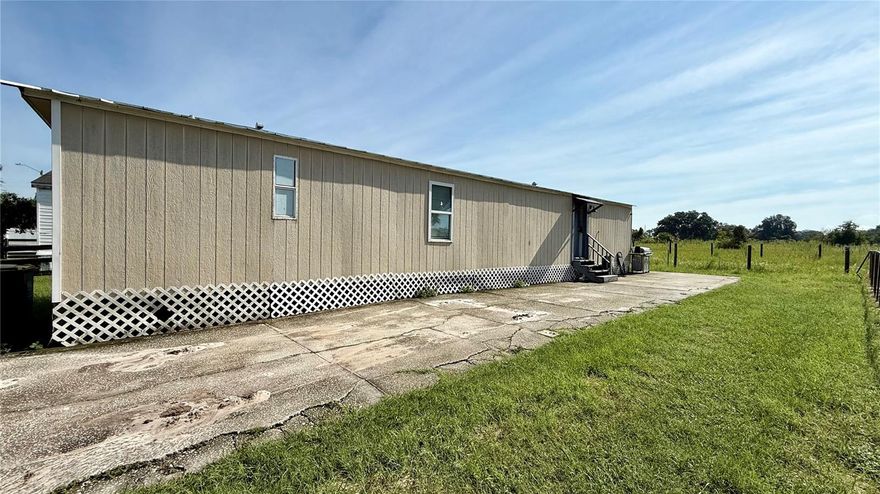 Exclusive cash-only sale. Beautiful 2-bedroom, 2-bath mobile home with lot included, located in the charming city of Haines City, FL. Well-distributed spaces provide comfort and functionality for the whole family. Enjoy a peaceful and private setting with ample outdoor space, perfect for gardening or outdoor activities. Strategically located near services, schools, and main access roads. This property, with no HOA, offers complete freedom with no fees or additional restrictions. Experience the peace and control that comes with owning your own land. Ideal for those seeking a cozy home or investors looking for a hassle-free opportunity. Call today to schedule a tour.