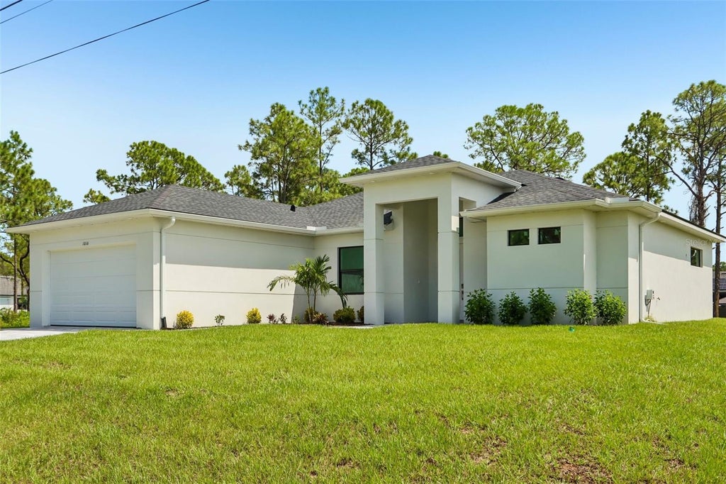 Photo of 1016 State Avenue, Lehigh Acres, FL 33972 (MLS # A4706017)