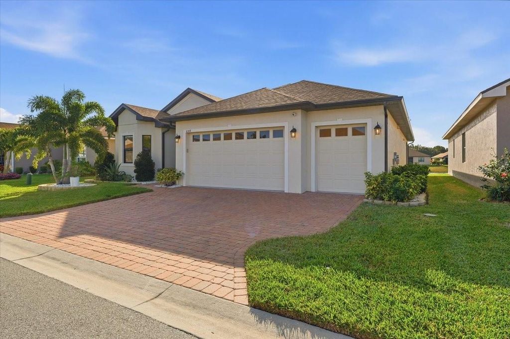 Photo of 6308 Pinehurst Loop, Winter Haven, FL 33884 (MLS # A4678252)