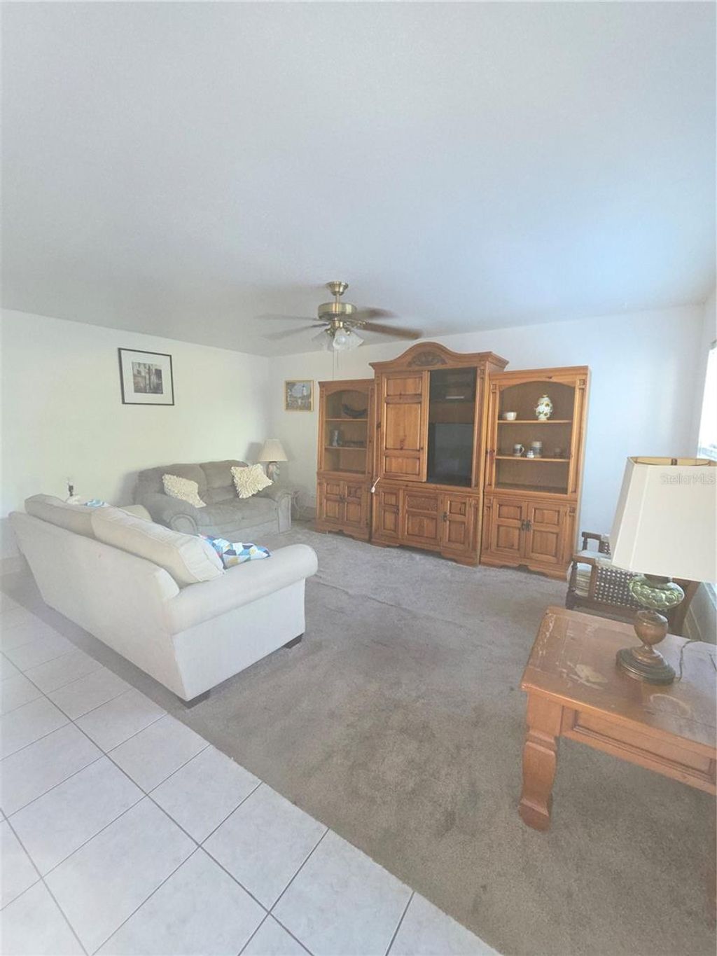 Photo of 101 Cambridge Trl #205, Sun City Center, FL 33573 (MLS # TB8492075)