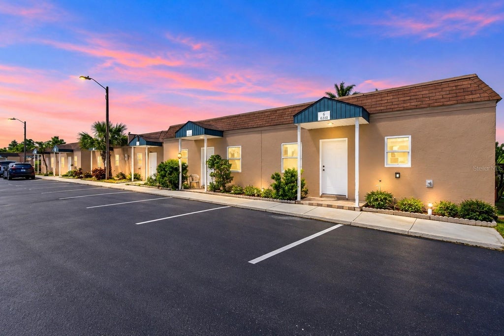 Photo of 6310 Providence Circle #6, New Port Richey, FL 34652 (MLS # TB8550417)