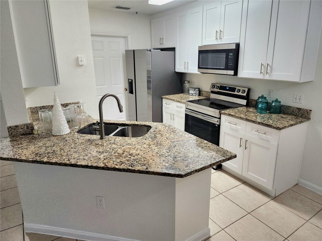 Photo of 6506 Swissco Drive #1315, Orlando, FL 32822 (MLS # S5147150)