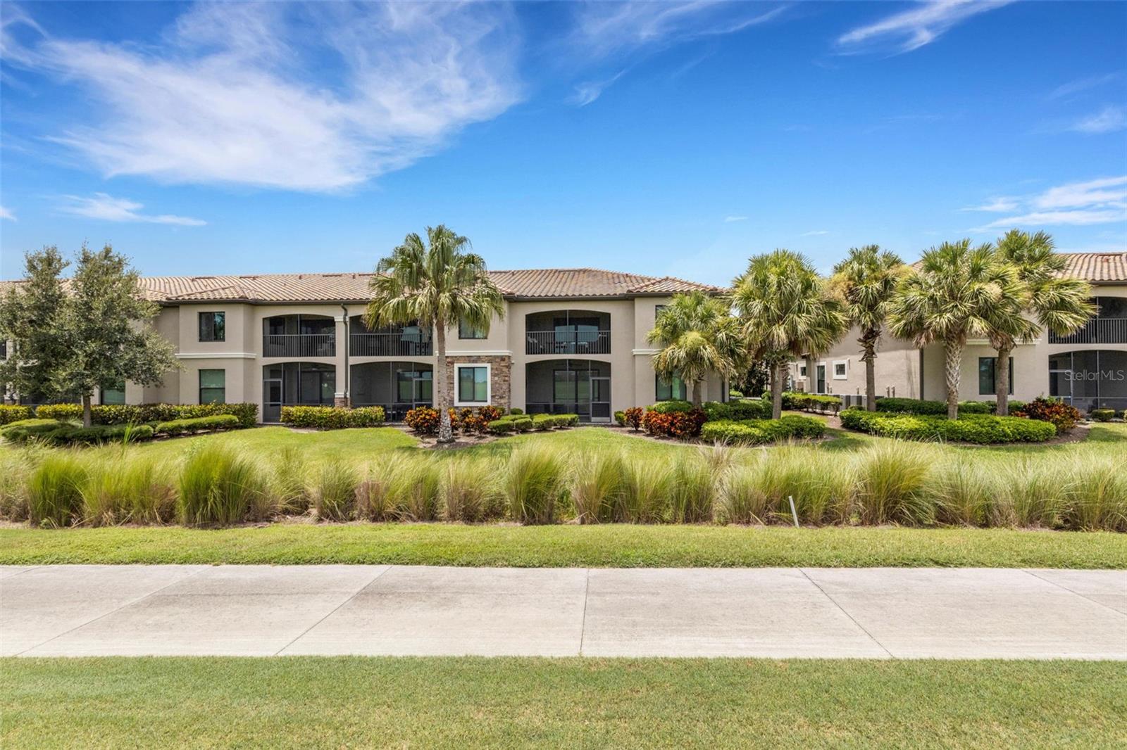 Resort-Style Living on the 9th Green – Fully Furnished & Move-In Ready!
Experience the ultimate Florida lifestyle in this end-unit condo perfectly positioned overlooking the 9th green of Lakewood National’s championship golf course—home to the Korn Ferry Tour tournament returning in 2026. This rare offering is fully furnished—just bring your toothbrush!
Step inside to find vaulted ceilings, fresh interior paint, upgraded porcelain tile flooring throughout, and elegant crown molding. The modern kitchen is open to the main living area and features upgraded soft-close cabinetry, quartz countertops, and premium finishes. The spacious master suite boasts two walk-in closets, dual sinks, and a beautifully tiled shower, while the versatile office/den includes a pull-out sofa for extra guests.
Turnkey convenience is yours with everything included—TVs, beds, office desk, washer & dryer, kitchenware, décor, and more. The master bedroom features a king-size bed for the ultimate comfort.
Your screened lanai offers sweeping views of the 9th green, perfect for enjoying your morning coffee or evening cocktails. Just a short walk from the clubhouse and all community amenities, you’ll have access to:
Two Arnold Palmer-designed golf courses
Premier tennis & pickleball courts
Resort-style pool with waterfalls, lap lanes & Tiki Bar
Two on-site restaurants
State-of-the-art fitness center
A vibrant calendar of events from the Lifestyle Director
Located in the gated community of Lakewood National, this condo blends luxury, leisure, and location into one perfect package. Whether you’re seeking a full-time residence, seasonal escape, or investment property, this home delivers it all.
Square Footage: End-unit layout offers more space than comparable interior units—ask for details.
Don’t miss this chance to own a piece of paradise in Lakewood Ranch’s premier golf community. Schedule your showing today!