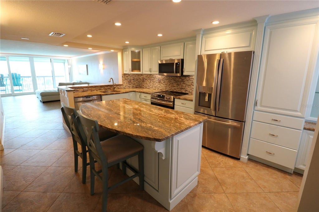 Photo of 9495 Blind Pass Road #504, St Pete Beach, FL 33706 (MLS # TB8543732)