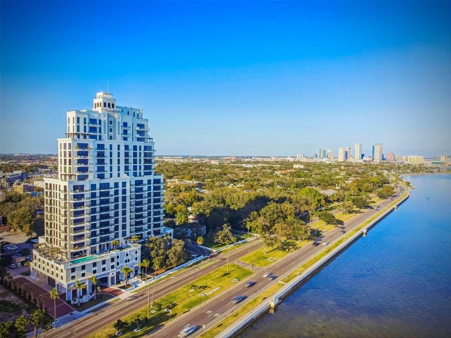 One or more photo(s) has been virtually staged.  Presenting the PERFECT Corner of The Hyde Park House, The Inman Plan, on the 16th Floor.  A true 3 bedroom, all with attached on-suite baths and a powder bath for your guests. The Inman plan is a very sought-after floor plan.  With glistening water views of Tampa Bay and downtown Tampa’s skyline Developed by Kolter the developers of ONE St. Petersburg and The Ritz Carlton Residences Sarasota.  This 22-floor stately residential tower offers just 70 exclusive residences located directly on Bayshore Boulevard in the heart of Historic Hyde Park.  Designer Curated Finishes and Color Palate complement this stunning residence features 10’ ceilings, expansive terraces with glass railings, owner’s suite with walk-in closet and dual European-style vanities, large laundry room with ample storage, 8’ decorative paneled entry doors and 8’ interior doors. Enjoy the finest finishes that include large porcelain tile flooring throughout, European cabinetry and quartz countertops in your chef’s kitchen with Gaggenau appliances, gas cooktop and large front-load Electrolux washers & dryers. Residents can enjoy unparalleled private amenities located conveniently on the 5th floor, the elevated waterfront amenity deck features a heated pool with shelf seating, relax in your private spa surrounded by tropical foliage, elegant entertainment areas with fire pits, bar, outdoor gas grills, large televisions and a state-of-the-art fitness center. Additional amenities also include 2 private secured parking spots, access-controlled entry to the building and elevators, dog washing station, bicycle storage, climate-controlled storage unit and 24/7 concierge. Nestled within Historic Hyde Park, walkable to South Tampa’s most popular shops, dining and nightlife, this waterfront property has quickly become our newest, most desirable, luxury high-rise residential tower.  Why wait, call today and schedule your private tour and begin living a life style with an Enviable View!