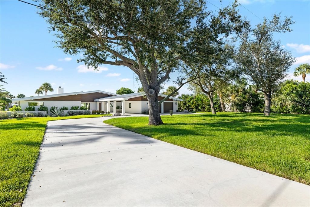 Photo of 515 Green Dolphin Drive S, Placida, FL 33946 (MLS # TB8440893)