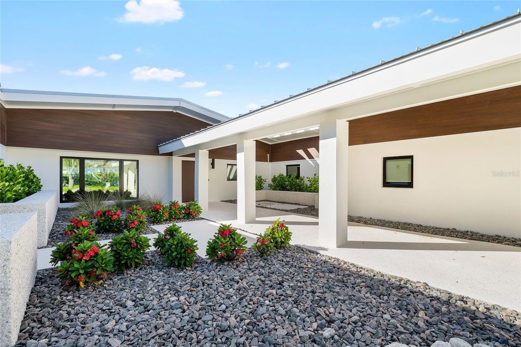 Photo of 515 Green Dolphin Drive S, Placida, FL 33946 (MLS # TB8440893)