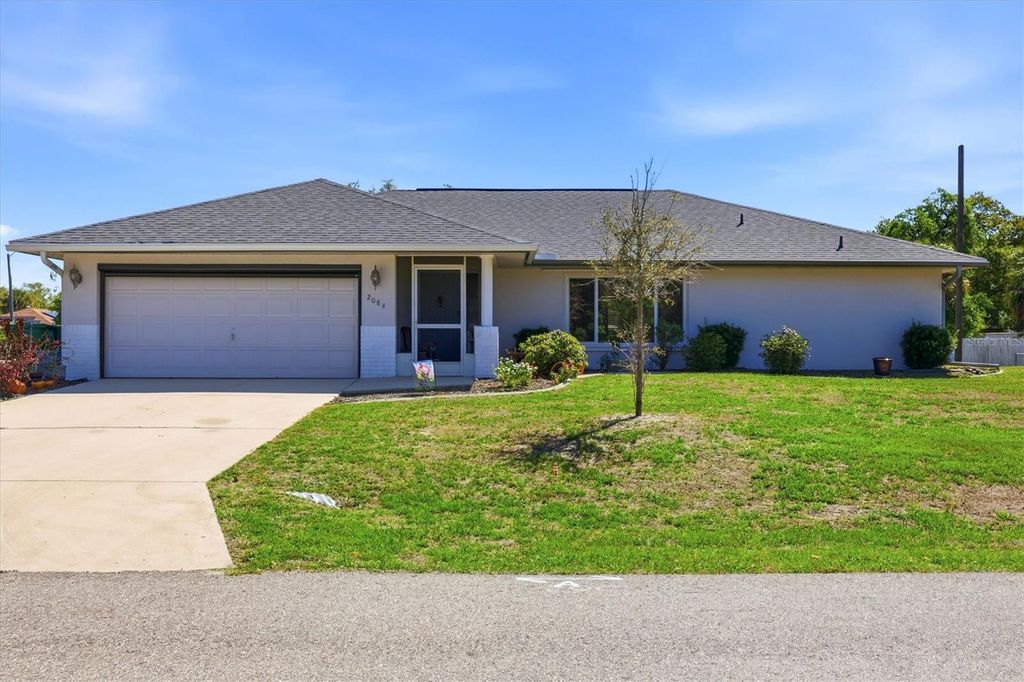 Photo of 2084 Leisure Street, Port Charlotte, FL 33948 (MLS # C7523982)