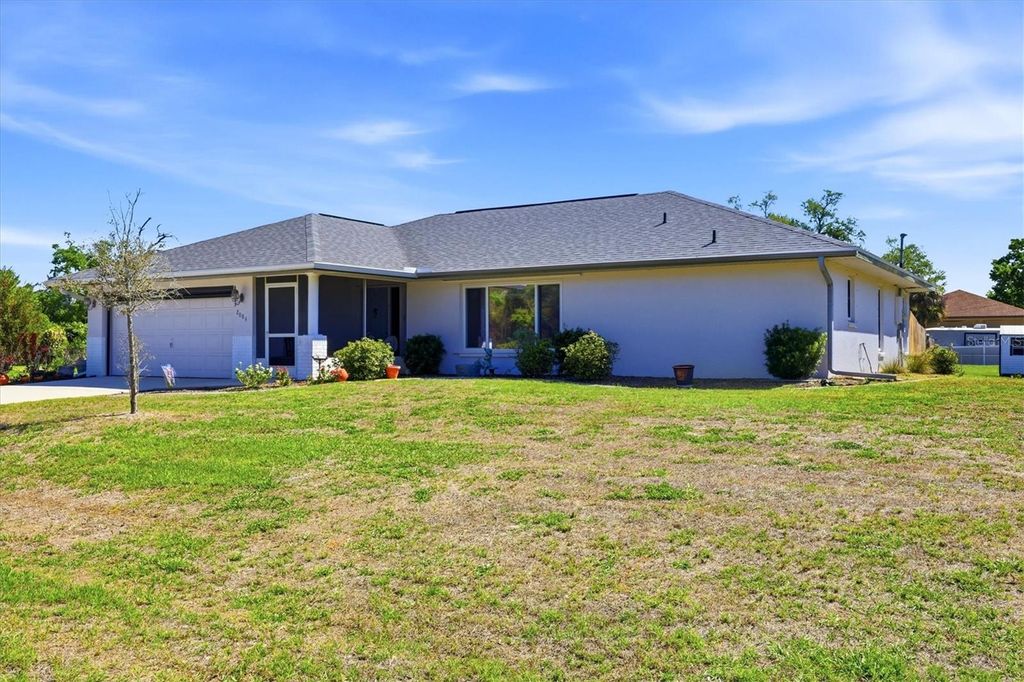 Photo of 2084 Leisure Street, Port Charlotte, FL 33948 (MLS # C7523982)
