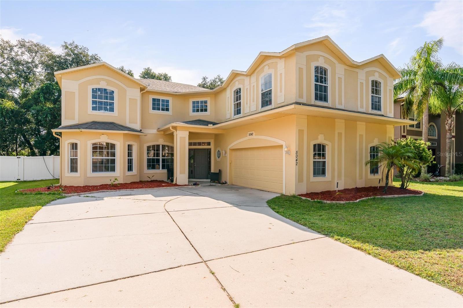 This stunning two-story home offers nearly 4,000 sq ft of living space with room for everyone and everything you love. Featuring 5 spacious bedrooms, 3 versatile living areas, and brand-new flooring throughout, this home is designed for both everyday comfort and entertaining.
Step outside to your expansive screened-in back porch overlooking a private, fenced backyard — big enough to create your own dream retreat with a pool, pickleball court, or lush garden.
Located in the gated Stoneybrook Hills community, you’ll enjoy beautifully landscaped streets, an impressive clubhouse with resort-style pool, fitness center, and more. HOA fees are already covered through March 2026!
Perfectly situated just 5 minutes to Publix and SR-429, and only 10 minutes from Downtown Mount Dora’s shops, dining, and festivals — with easy access to Orlando, too.
Don’t miss your chance to call this extraordinary home yours.