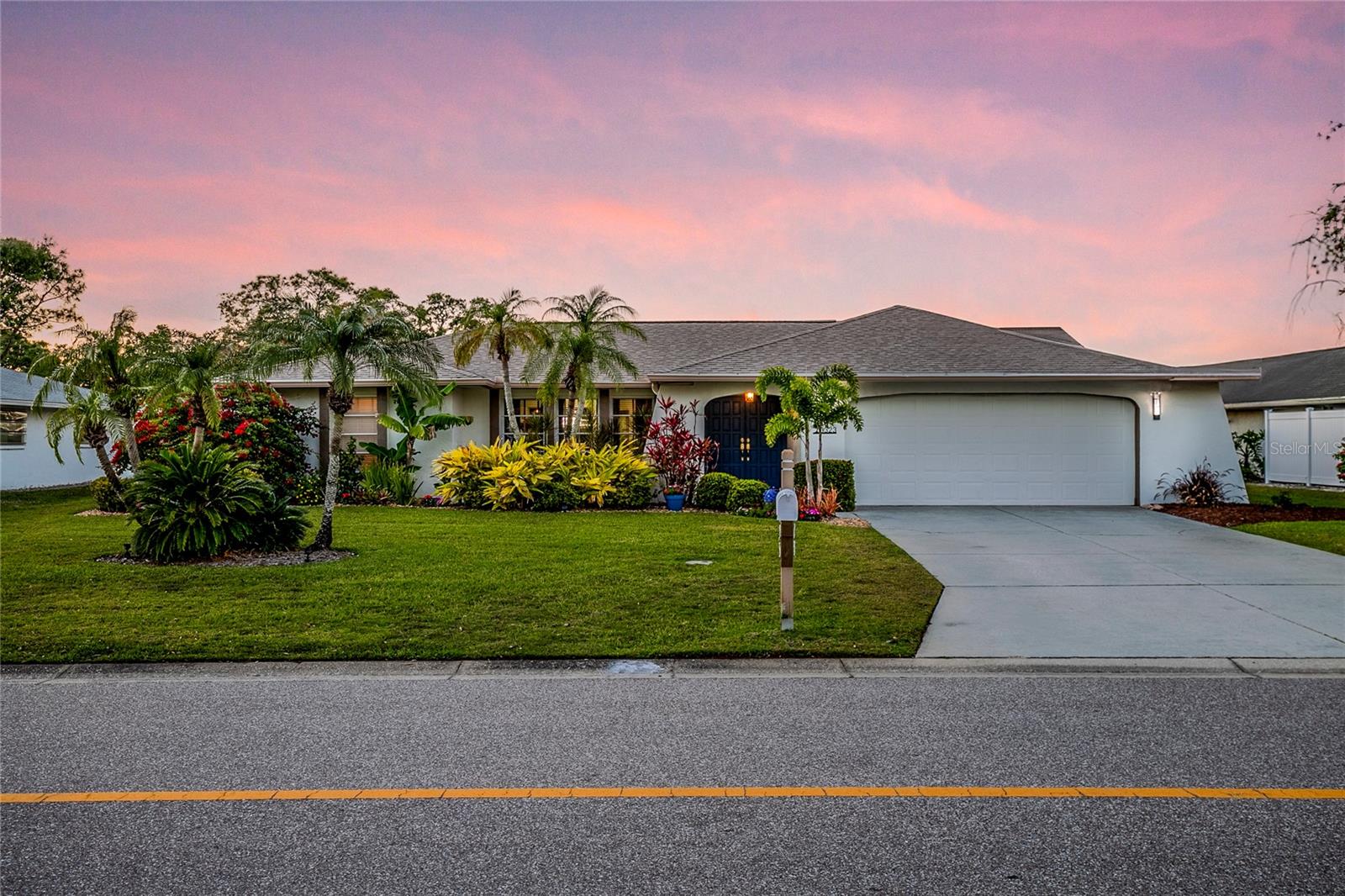 LOCATION, LOCATION!! This homes features upgraded Samsung appliances, 2022 roof install, upgraded lighting, new water heater. One of the home's standout features is the expansive lanai and new cage covering the sparkling heated pool area, accessible through disappearing sliders. Enjoy shopping at the Villages and nearby attractions like Benderson Park, MoteSEA Aquarium, the future Sarasota Orchestra, and The Mall at University Town Center! American Home Shield Warranty is included!